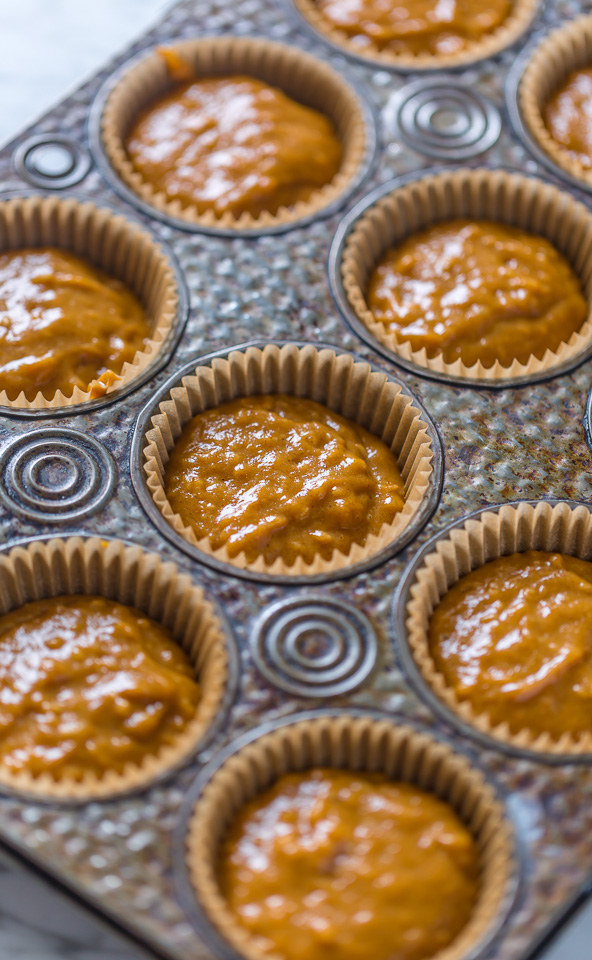Moist and fluffy Pumpkin Coconut Cupcakes are stuffed with decadent Dulce de Ceche and covered in cinnamon cream cheese frosting! So delicious!