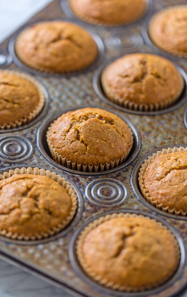 Moist and fluffy Pumpkin Coconut Cupcakes are stuffed with decadent Dulce de Ceche and covered in cinnamon cream cheese frosting! So delicious!