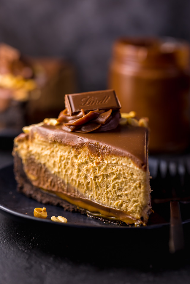 Slice of no bake peanut butter pie with chocolate on top.