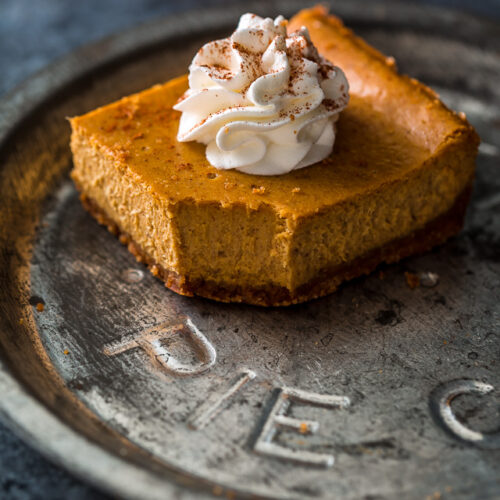 An easy and delicious recipe for Pumpkin Pie Cheesecake Bars! Made with a whole can of pumpkin!!! The best part is this recipe is freezer friendly.