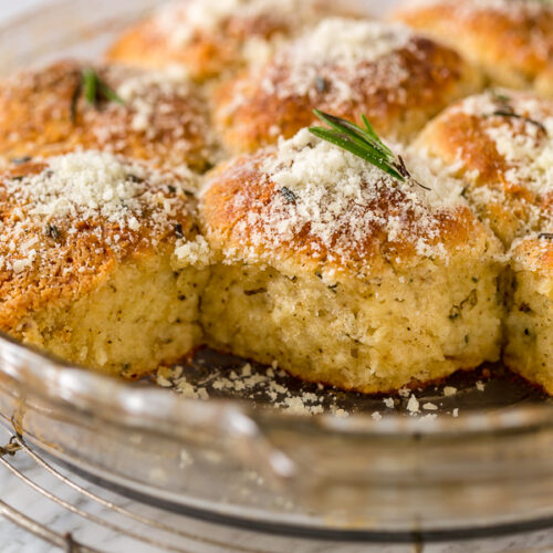 Rosemary Parmesan Biscuits are fluffy, flavorful, and so good with a bowl of soup or chili! Perfect for Thanksgiving, too!