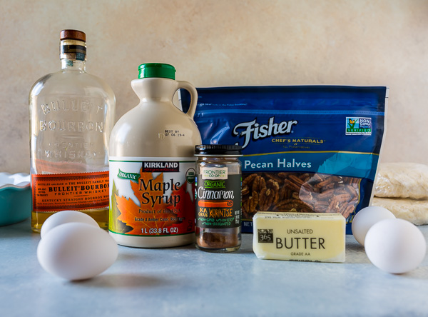 Ingredients for maple syrup pecan pie.