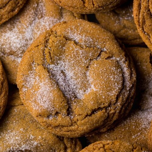 Thick and CHEWY Bourbon Molasses Cookies are perfect for the holidays! Made with brown sugar and plenty of festive spices, these cookies are so soft and flavorful!