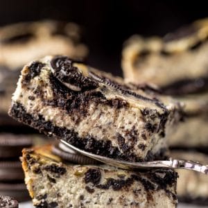 The Best Oreo Cheesecake Bars! So thick and creamy! #oreo #cheesecake #cheesecakebars #oreodesserts