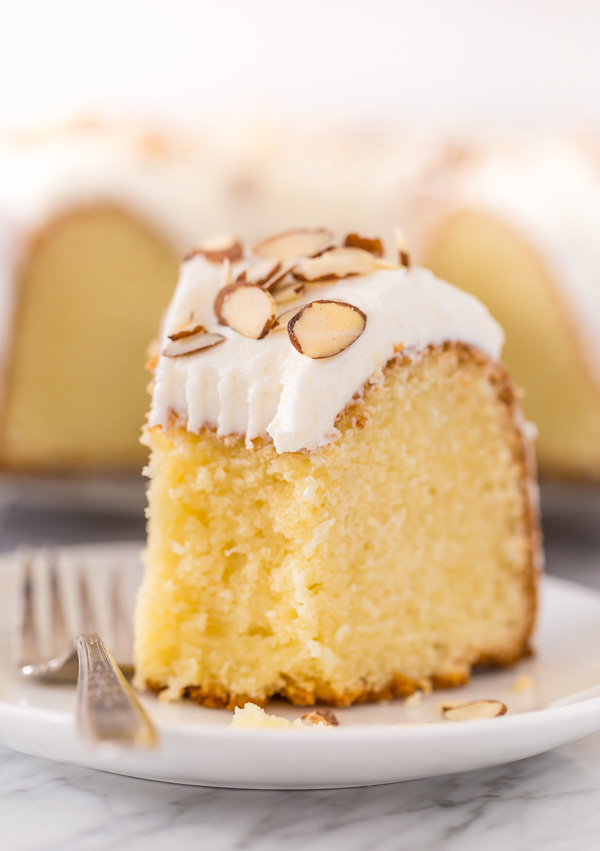 This Almond Amaretto Pound Cake is moist, buttery, and so flavorful! Topped with homemade Almond and Amaretto Cream Cheese Frosting and Slivered Almonds, it's a total showstopper, too. Perfect for any celebration!