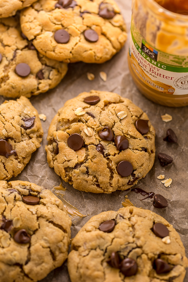 These Peanut Butter Oatmeal Chocolate Chip Cookies are so thick and chewy! Loaded with creamy peanut butter flavor, old-fashioned oats, and chocolate chips, these are a must try for peanut butter lovers! You don't have to chill the cookie dough, which makes this recipe quick and easy to bake.