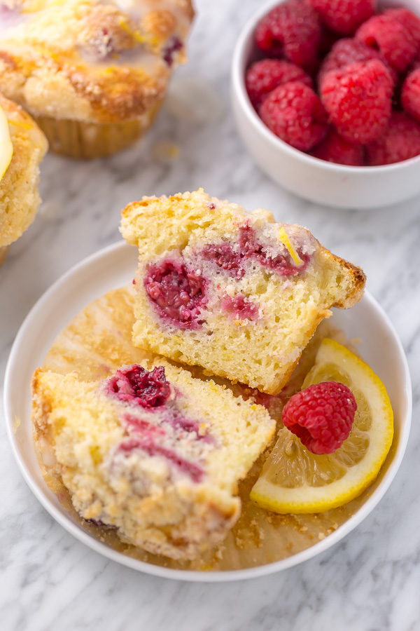 Moist and sunshiny sweet, these Lemon Raspberry Crumb Muffins are so good with a cup of coffee! Loaded with fresh raspberries and bursting with real lemon flavor, these are a must try for any lemon and raspberry lover!