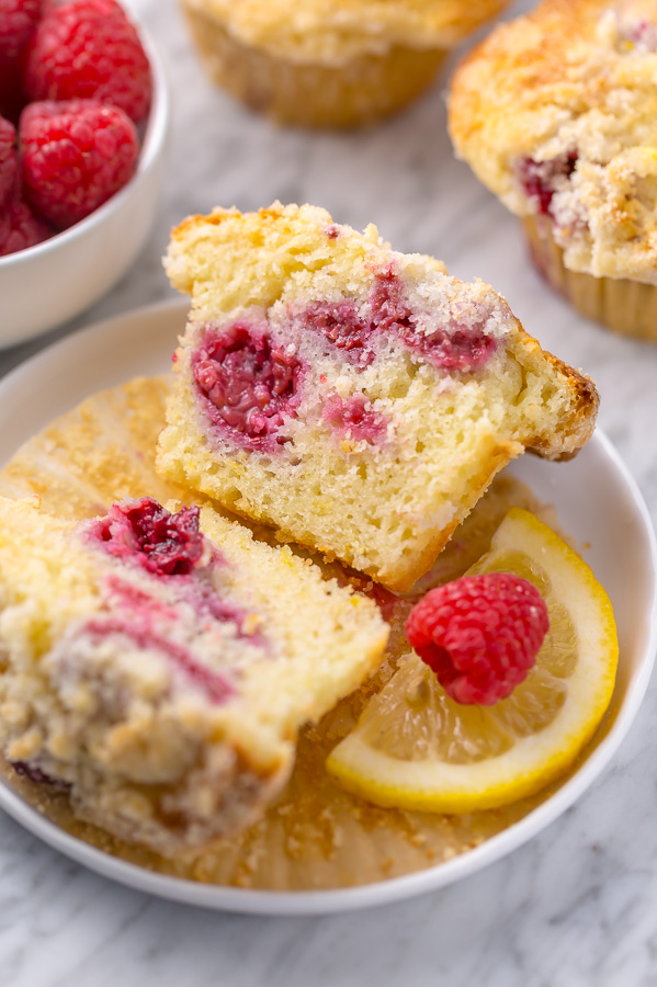 Moist and sunshiny sweet, these Lemon Raspberry Crumb Muffins are so good with a cup of coffee! Loaded with fresh raspberries and bursting with real lemon flavor, these are a must try for any lemon and raspberry lover!