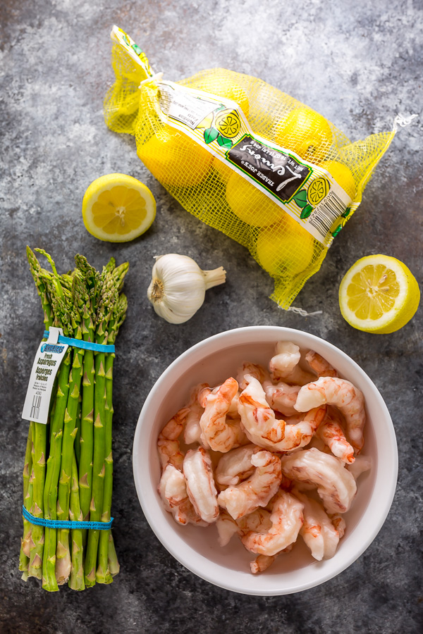 This quick and easy Lemon Garlic Shrimp and Asparagus is ready in less than 20 minutes! This one pan meal is exploding with flavor and always a crowd-pleaser. So next time you're looking for a healthy dinner, give this garlic shrimp and asparagus a try!