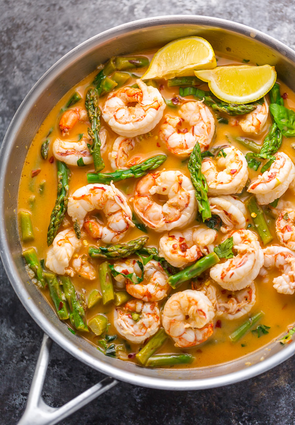 This quick and easy Lemon Garlic Shrimp and Asparagus is ready in less than 20 minutes! This one pan meal is exploding with flavor and always a crowd-pleaser. So next time you're looking for a healthy dinner, give this garlic shrimp and asparagus a try!