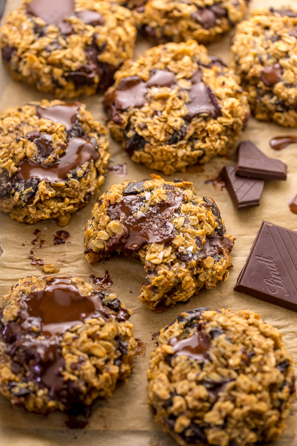 These Gluten Free Oatmeal Cookies are soft yet crunchy and loaded with gooey chocolate! Made with gluten free oats, almond flour, and shredded coconut, these cookies are completely gluten free. So delicious with a glass of milk!