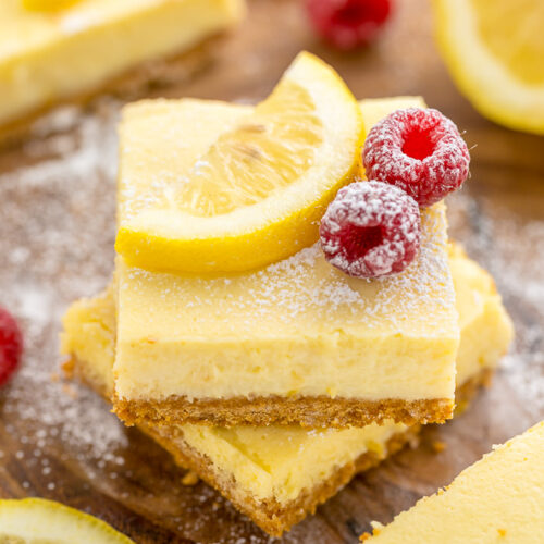 These Lemon Pie Bars are made with lemon juice, lemon zest, and lemon extract, so you know they're loaded with lemon flavor! Sprinkle each bar with powdered sugar and serve with fresh raspberries. Anyone who loves lemon should try this easy lemon dessert!!!