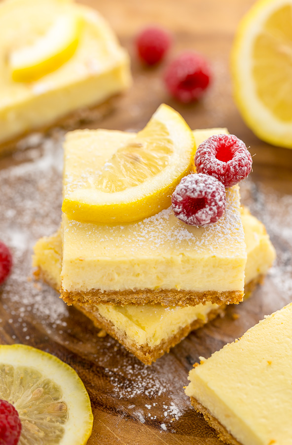 These Lemon Pie Bars are made with lemon juice, lemon zest, and lemon extract, so you know they're loaded with lemon flavor! Sprinkle each bar with powdered sugar and serve with fresh raspberries. Anyone who loves lemon should try this easy lemon dessert!!!