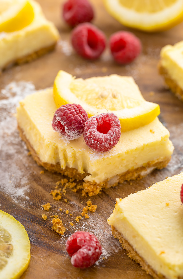 These Lemon Pie Bars are made with lemon juice, lemon zest, and lemon extract, so you know they're loaded with lemon flavor! Sprinkle each bar with powdered sugar and serve with fresh raspberries. Anyone who loves lemon should try this easy lemon dessert!!!