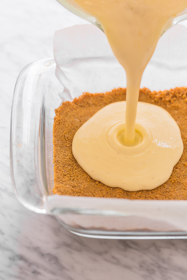 These Lemon Pie Bars are made with lemon juice, lemon zest, and lemon extract, so you know they're loaded with lemon flavor! Sprinkle each bar with powdered sugar and serve with fresh raspberries. Anyone who loves lemon should try this easy lemon dessert!!!