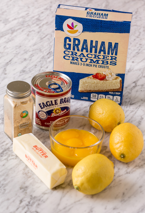 These Lemon Pie Bars are made with lemon juice, lemon zest, and lemon extract, so you know they're loaded with lemon flavor! Sprinkle each bar with powdered sugar and serve with fresh raspberries. Anyone who loves lemon should try this easy lemon dessert!!!