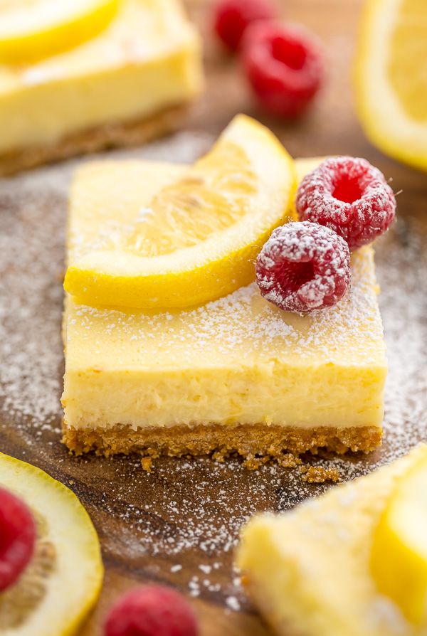 These Lemon Pie Bars are made with lemon juice, lemon zest, and lemon extract, so you know they're loaded with lemon flavor! Sprinkle each bar with powdered sugar and serve with fresh raspberries. Anyone who loves lemon should try this easy lemon dessert!!!