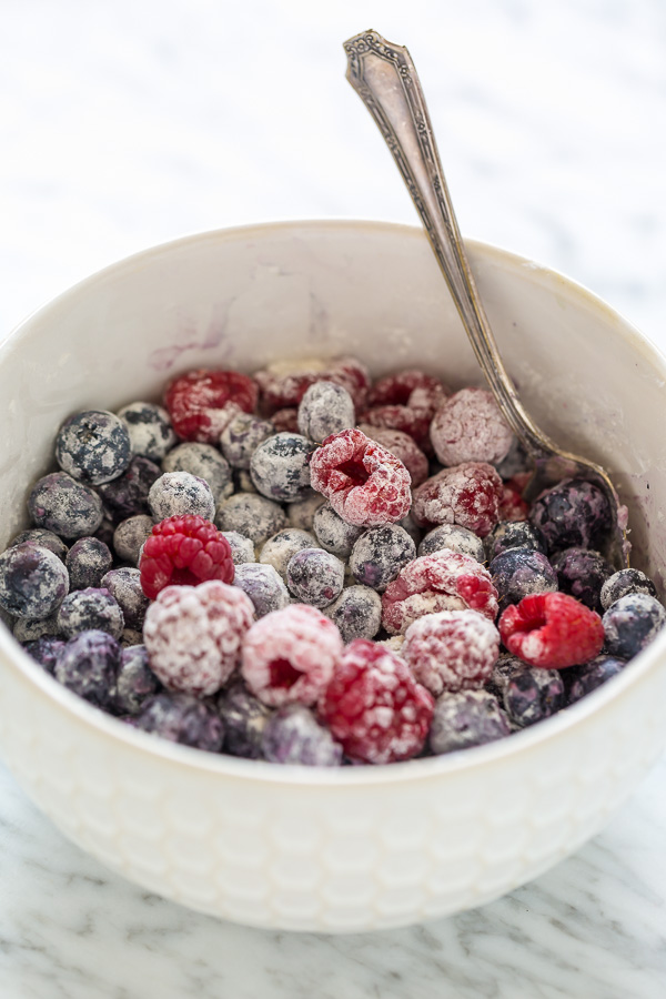 Toss berries in flour.
