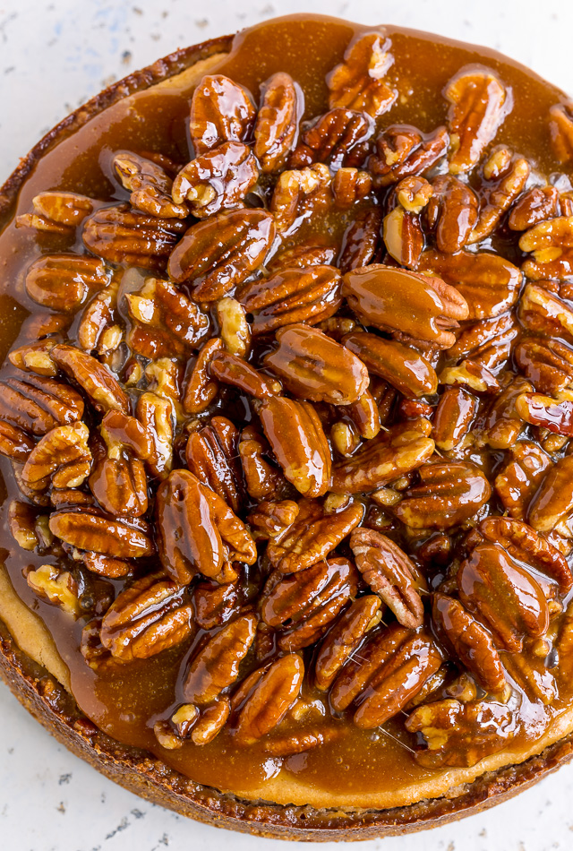 Pecan pie cheesecake with gooey pecan topping.