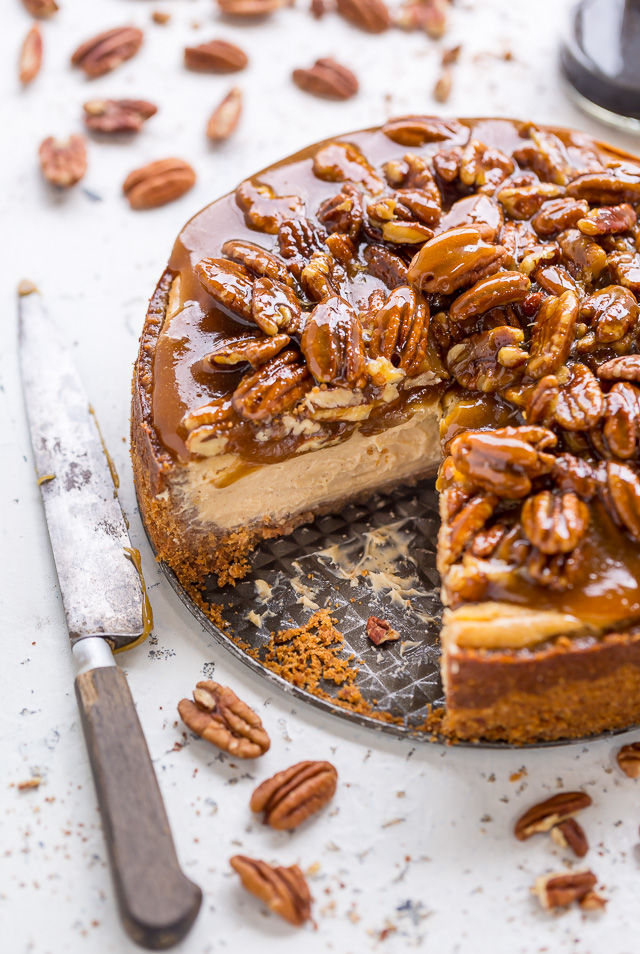 Pecan pie cheesecake with gooey pecan pie topping.