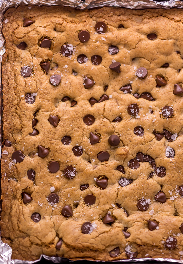 Easy Chocolate Chip Cookie Bars are thick, chewy, and basically foolproof! A great bar recipe that bakes up in less than 30 minutes! If you're serving a crowd, simply double the recipe and bake it in a 9 x 13 pan!