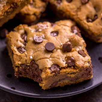 Easy Chocolate Chip Cookie Bars are thick, chewy, and basically foolproof! A great bar recipe that bakes up in less than 30 minutes! If you're serving a crowd, simply double the recipe and bake it in a 9 x 13 pan!