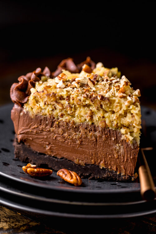This No-Bake German Chocolate Cheesecake is insanely decadent and such a treat! Featuring a crunchy Oreo cookie crust, creamy chocolate cheesecake filling, and coconut and pecan topping... it's a total showstopper! Bonus: You can make this up to 4 days in advance!