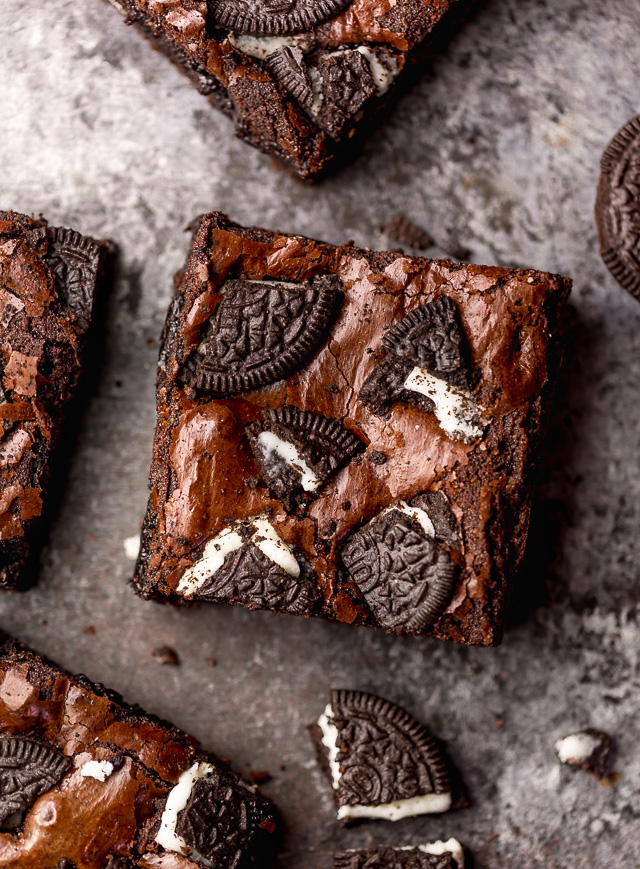 Oreo Brownies are so easy and a MILLION times more delicious than boxed brownie mix! Loaded with rich chocolate flavor, chocolate chips, and plenty of crushed Oreo cookies! Preheat your oven to 350 and bake these brownies today!