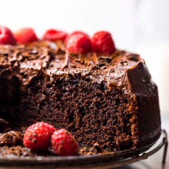 This Easy Single Layer Chocolate Cake is utterly moist and topped with melt-in-your-mouth Chocolate Frosting! The perfect dessert for date night in, small birthday celebrations, and intimate gatherings. And no electric mixer required!