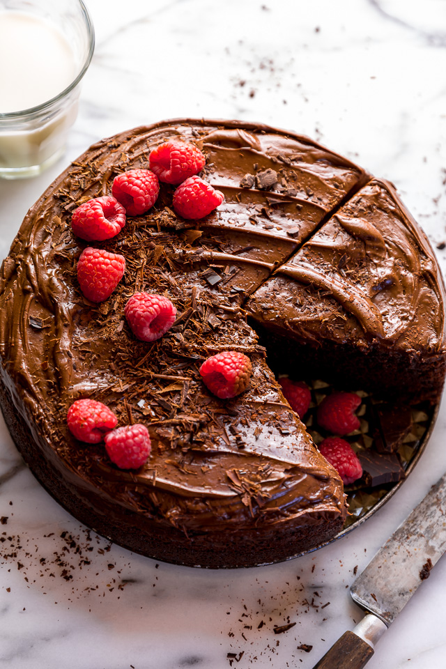 This Easy Single Layer Chocolate Cake is utterly moist and topped with melt-in-your-mouth Chocolate Frosting! The perfect dessert for date night in, small birthday celebrations, and intimate gatherings. And no electric mixer required!