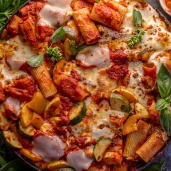 Preheat your oven to 350, because we're making Baked Rigatoni Fra Diavolo with Sausage and Zucchini for dinner tonight! Featuring a spicy tomato sauce loaded with fresh herbs, Italian sausage, tender zucchini, and tons of gooey cheese! This is Summer comfort food at its best!