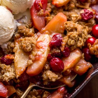 If you love cranberries and apples, you have to try this Easy Apple Cranberry Crisp! Featuring juicy apples, tart cranberries, and a buttery oat crumble topping! Use fresh cranberries or frozen cranberries... both work great! Perfect for Thanksgiving or Christmas dessert!