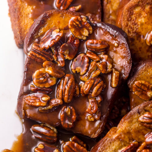 Brown Sugar Butter Pecan French Toast is a decadent breakfast that's perfect for special occasions... like Christmas morning!!! Thick slices of brioche are fried until golden brown and then topped with the most delicious brown sugar butter pecan syrup! So decadent, you don't even need to serve with maple syrup!