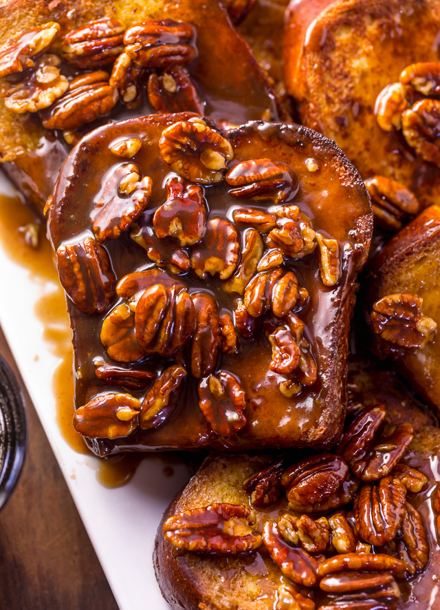 Brown Sugar Butter Pecan French Toast is a decadent breakfast that's perfect for special occasions... like Christmas morning!!! Thick slices of brioche are fried until golden brown and then topped with the most delicious brown sugar butter pecan syrup! So decadent, you don't even need to serve with maple syrup!