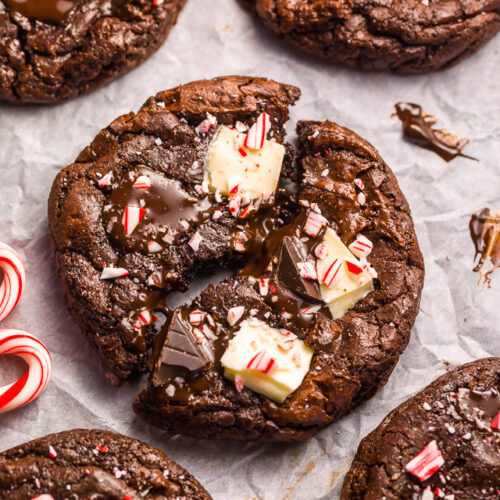 If you enjoy the combination of dark chocolate and perky peppermint, you're going to LOVE these Double Chocolate Peppermint Fudge Cookies! Topped with gooey chocolate chunks, a white chocolate layer, plus crushed candy canes, these cookies are as beautiful as they are delicious! And a must bake this holiday season!