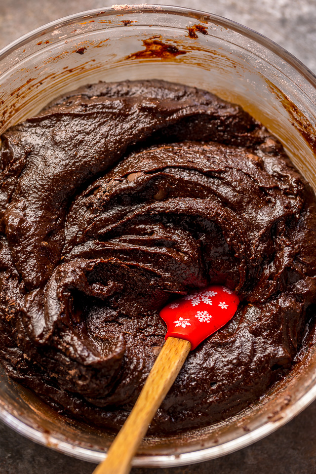 If you enjoy the combination of dark chocolate and perky peppermint, you're going to LOVE these Double Chocolate Peppermint Fudge Cookies! Topped with gooey chocolate chunks, a white chocolate layer, plus crushed candy canes, these cookies are as beautiful as they are delicious! And a must bake this holiday season!