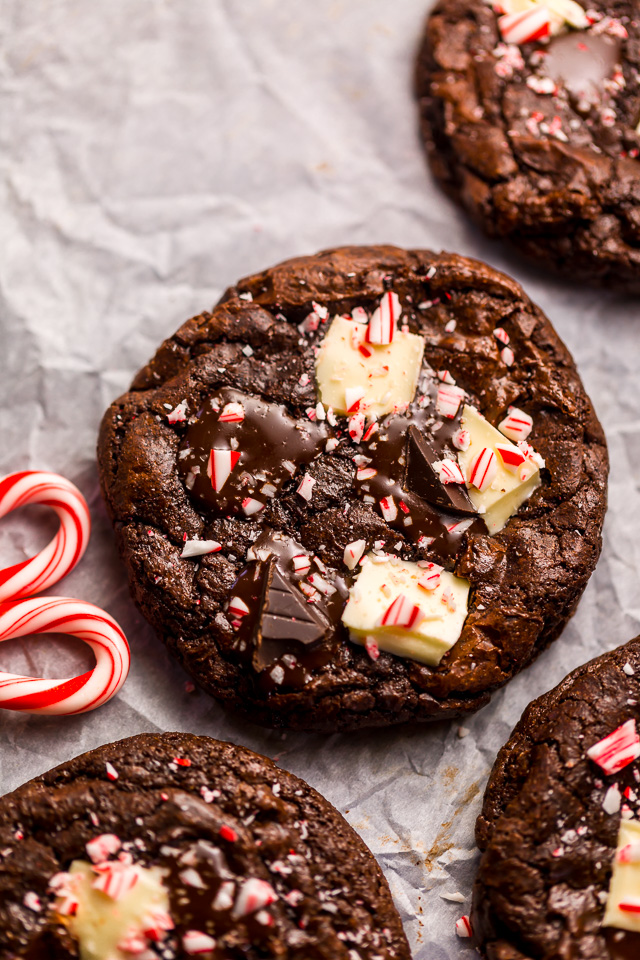 If you enjoy the combination of dark chocolate and perky peppermint, you're going to LOVE these Double Chocolate Peppermint Fudge Cookies! Topped with gooey chocolate chunks, a white chocolate layer, plus crushed candy canes, these cookies are as beautiful as they are delicious! And a must bake this holiday season!