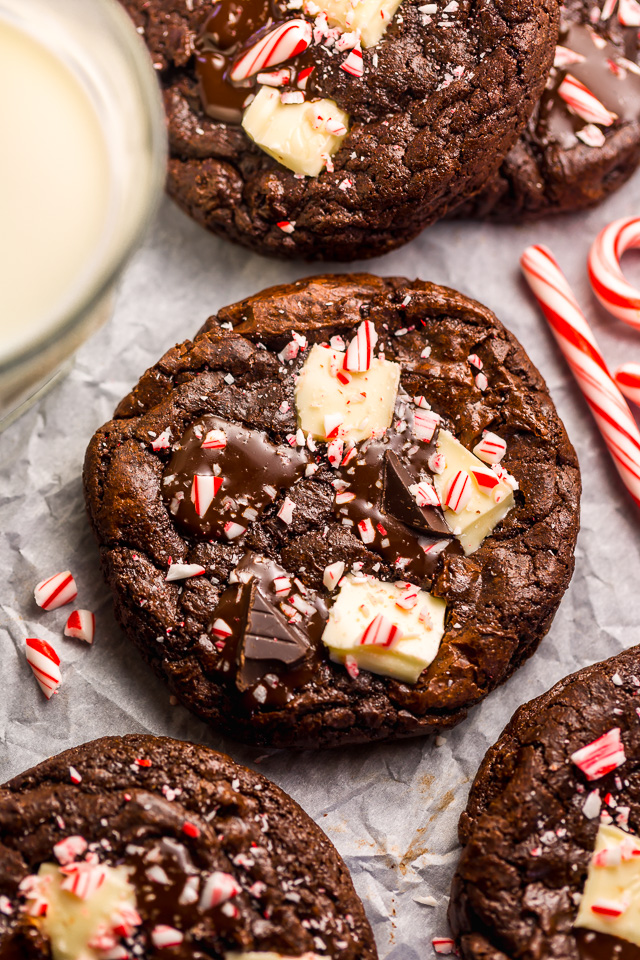 If you enjoy the combination of dark chocolate and perky peppermint, you're going to LOVE these Double Chocolate Peppermint Fudge Cookies! Topped with gooey chocolate chunks, a white chocolate layer, plus crushed candy canes, these cookies are as beautiful as they are delicious! And a must bake this holiday season!
