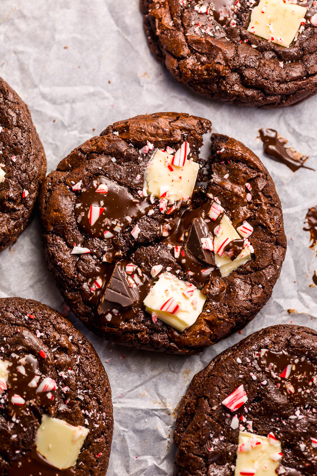 If you enjoy the combination of dark chocolate and perky peppermint, you're going to LOVE these Double Chocolate Peppermint Fudge Cookies! Topped with gooey chocolate chunks, a white chocolate layer, plus crushed candy canes, these cookies are as beautiful as they are delicious! And a must bake this holiday season!