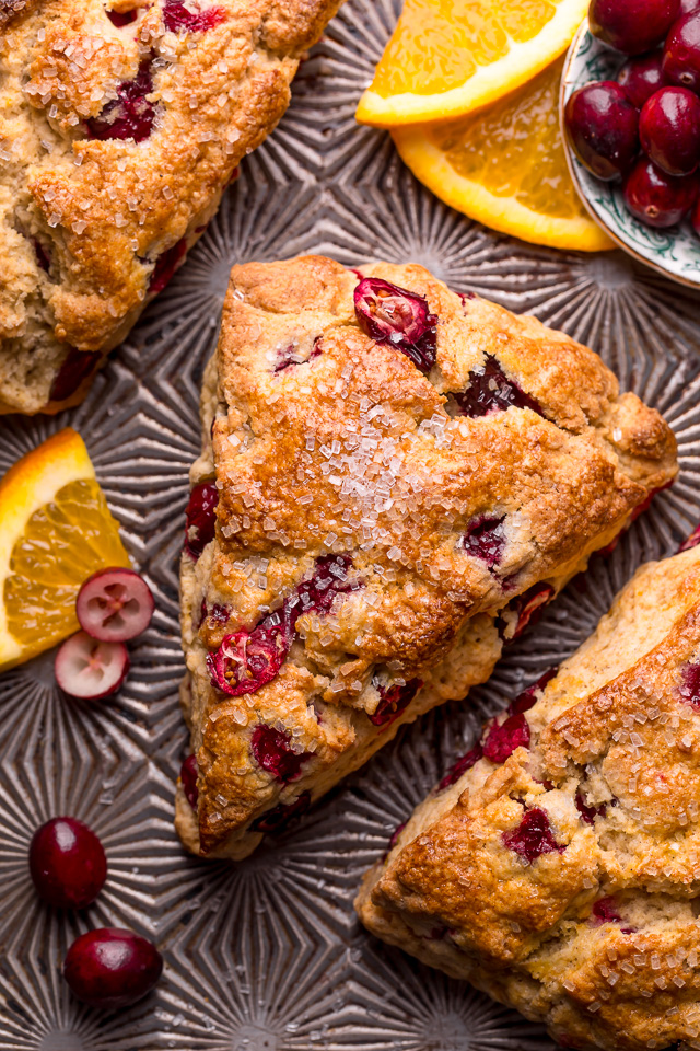 Cranberry orange scone on baking sheet.