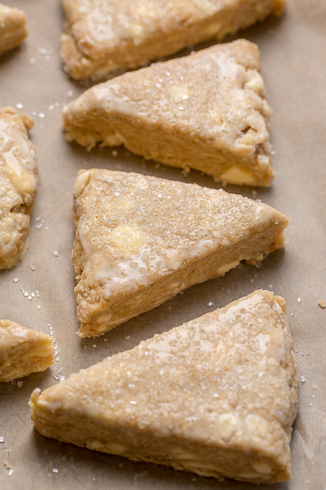These Bakery-Style Eggnog Scones are flaky, buttery, and loaded with eggnog flavor! Topped with a sweet eggnog glaze, they're perfect for Christmas morning! Best served warm, with a cup of coffee or tea!