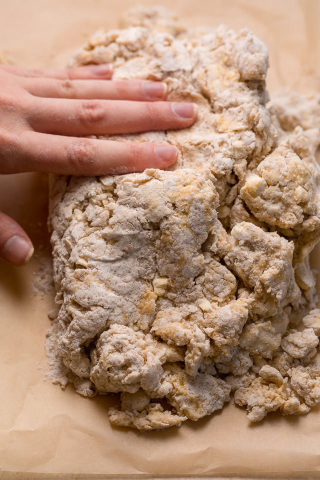 These Bakery-Style Eggnog Scones are flaky, buttery, and loaded with eggnog flavor! Topped with a sweet eggnog glaze, they're perfect for Christmas morning! Best served warm, with a cup of coffee or tea!