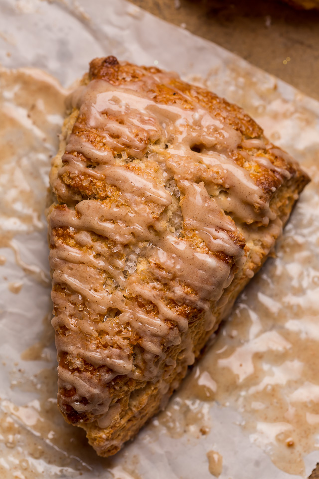 These Bakery-Style Eggnog Scones are flaky, buttery, and loaded with eggnog flavor! Topped with a sweet eggnog glaze, they're perfect for Christmas morning! Best served warm, with a cup of coffee or tea!