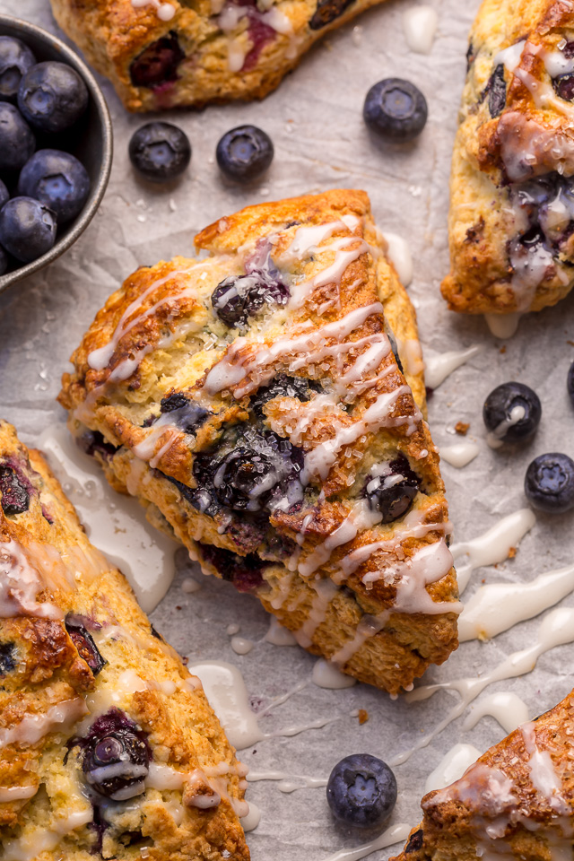 Blueberry Scones on baking sheet with glaze