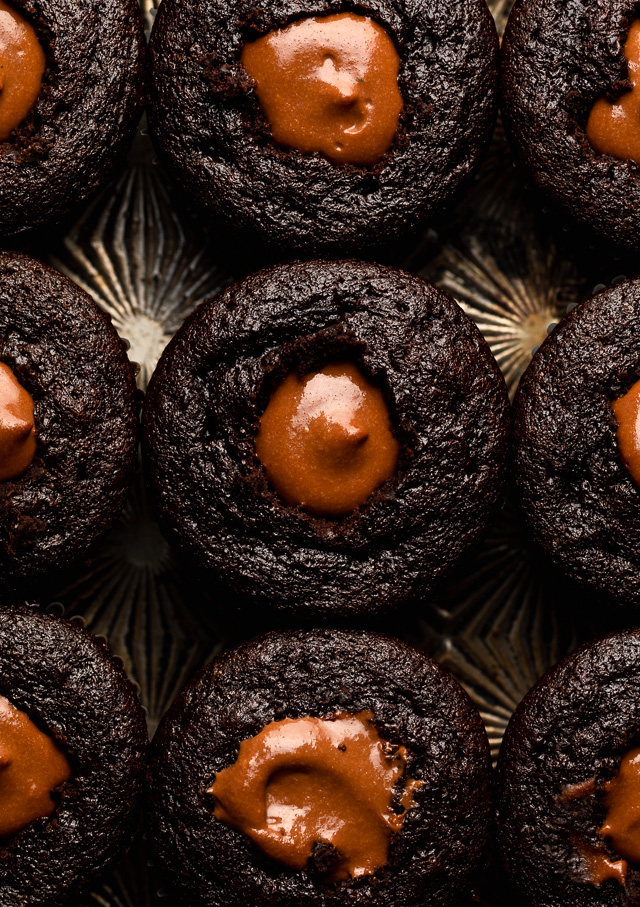 The Best Brooklyn Blackout Cupcakes are insanely moist, filled with chocolate pudding, and topped with fudgy chocolate frosting and chocolate cake crumbs! Just like Brooklyn Blackout Cake... but in cupcake form! These require a little advance planning, but are sure to be a showstopper at your next event!