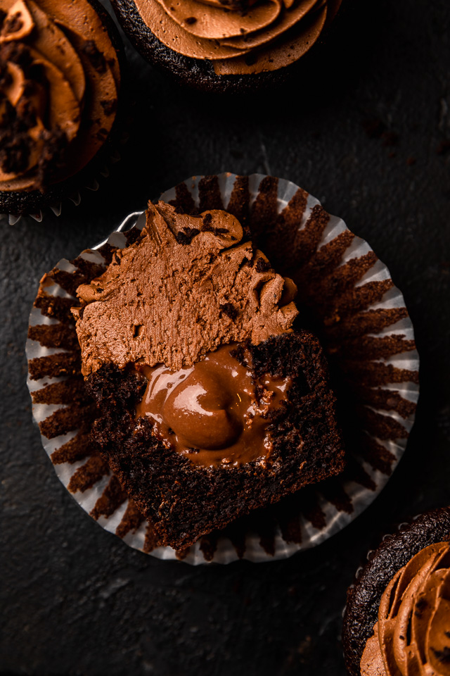 The Best Brooklyn Blackout Cupcakes are insanely moist, filled with chocolate pudding, and topped with fudgy chocolate frosting and chocolate cake crumbs! Just like Brooklyn Blackout Cake... but in cupcake form! These require a little advance planning, but are sure to be a showstopper at your next event!