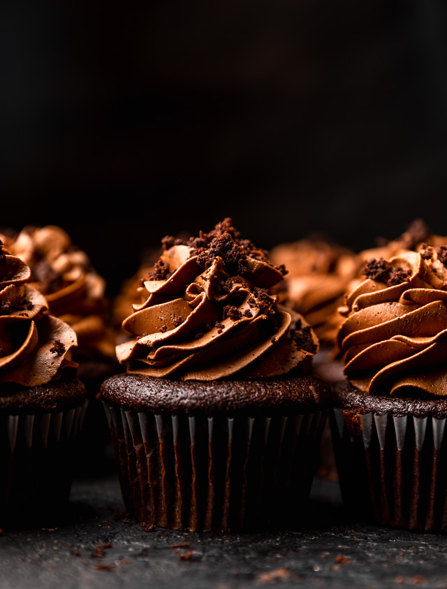 The Best Brooklyn Blackout Cupcakes are insanely moist, filled with chocolate pudding, and topped with fudgy chocolate frosting and chocolate cake crumbs! Just like Brooklyn Blackout Cake... but in cupcake form! These require a little advance planning, but are sure to be a showstopper at your next event!