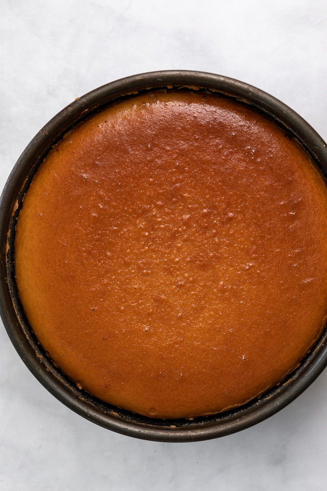 This Chocolate Covered Peanut Butter Cheesecake is ultra creamy and the perfect marriage of chocolate and peanut butter! Featuring an oreo crust, creamy peanut butter cheesecake filling, and topped with with peanut butter chocolate ganache and peanut butter cups, it's a true showstopper! And any leftovers freeze great!