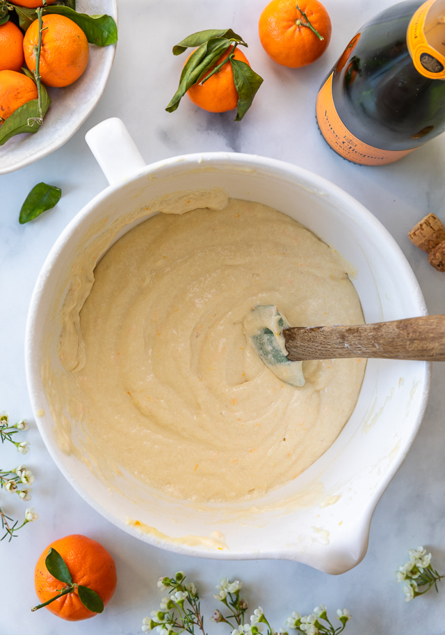 Today I'm teaching you how to make Mimosa Cupcakes! Light and fluffy, these delicious cupcakes are made with freshly squeezed orange juice, orange zest, and of course, CHAMPAGNE! One of my favorite cupcake recipes for brunch or special occasions like Easter, Mother's Day, or New Year's Eve!