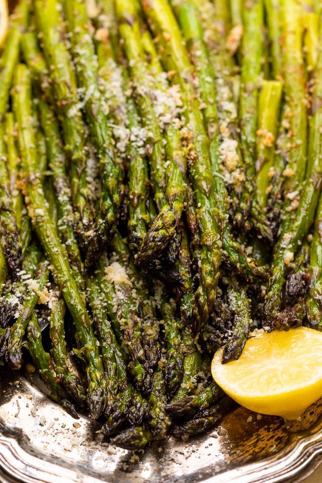 This Lemon Garlic Parmesan Asparagus is a quick and easy side dish that's ready in less than 20 minutes! Perfect with grilled meat, seafood, or a ball of burrata and some charred bread! No matter what you serve it with, I just know you're going to love this recipe!